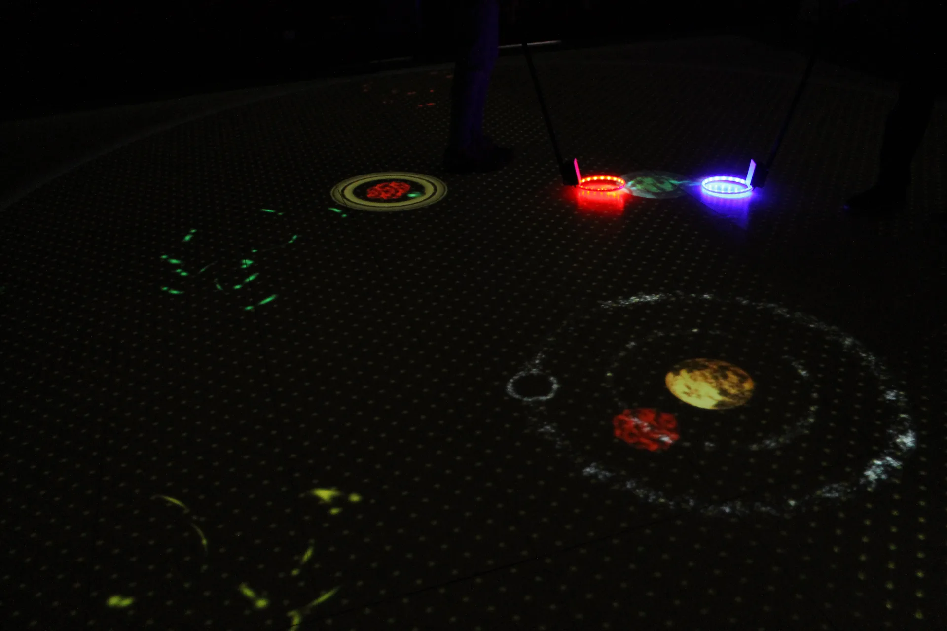 Players moving a planet together.